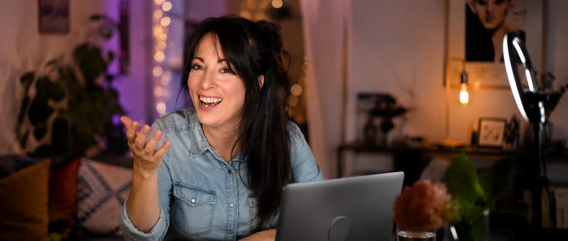 A Couple event host welcoming guests during a live online mixer